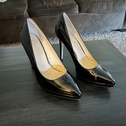 Women’s size 8 black patent leather platform heels by Jessica Simpson