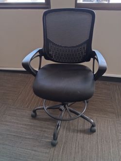 2 Black rolling office chairs.  Mesh.