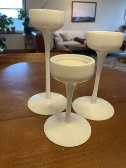 3 White Ceramic Candlestick Holders And Candles