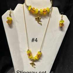 Set of Necklace, Earrings and Bracelet 