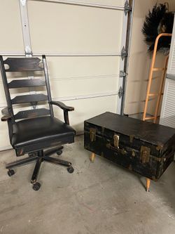 Black ladder back chair and vintage trunk/chest