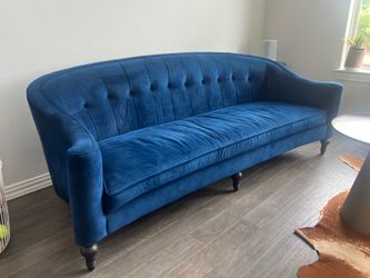Blue velvet sofa