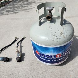 propane tank + regulator
1 tank: 15 lbs, empty
2 regulator hose
all for $10
