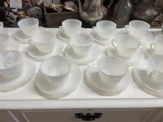 Milk glass tea cup and saucer $10 each