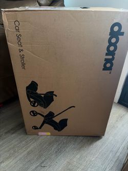 Brand new Doona blush pink stroller/ car seat