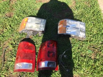 2007 GMC. Headlights and tail lights
