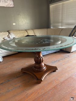 Wood dining table with round glass top