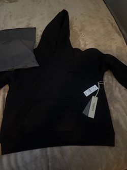 size small all black essentials hoodie