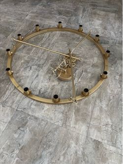 Gold chandelier with bulbs