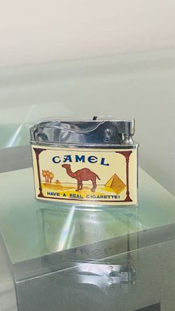 Rare 75th Anniversary  Vintage Zenith or Penguin automatic cigarette lighter featuring Camel cigarette advertising