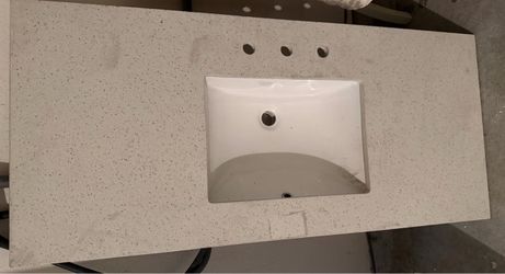Vanity top including sink