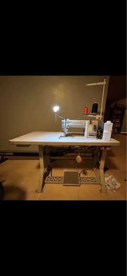 Sewing machine with fabric