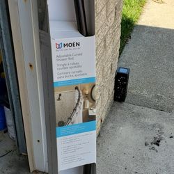 Moen Adjustable Curved Shower Rod