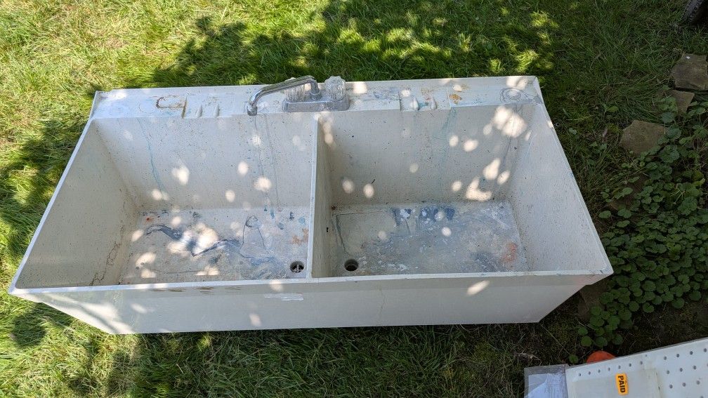 Used Double Sided Utility Slop Sink Standard Size. Needs Legs
