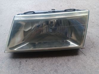 Headlamp for 05 mercury grand Marques