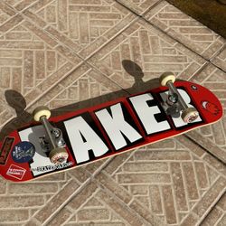 Barely Used Baker Skateboard With Pro S1 Helmet