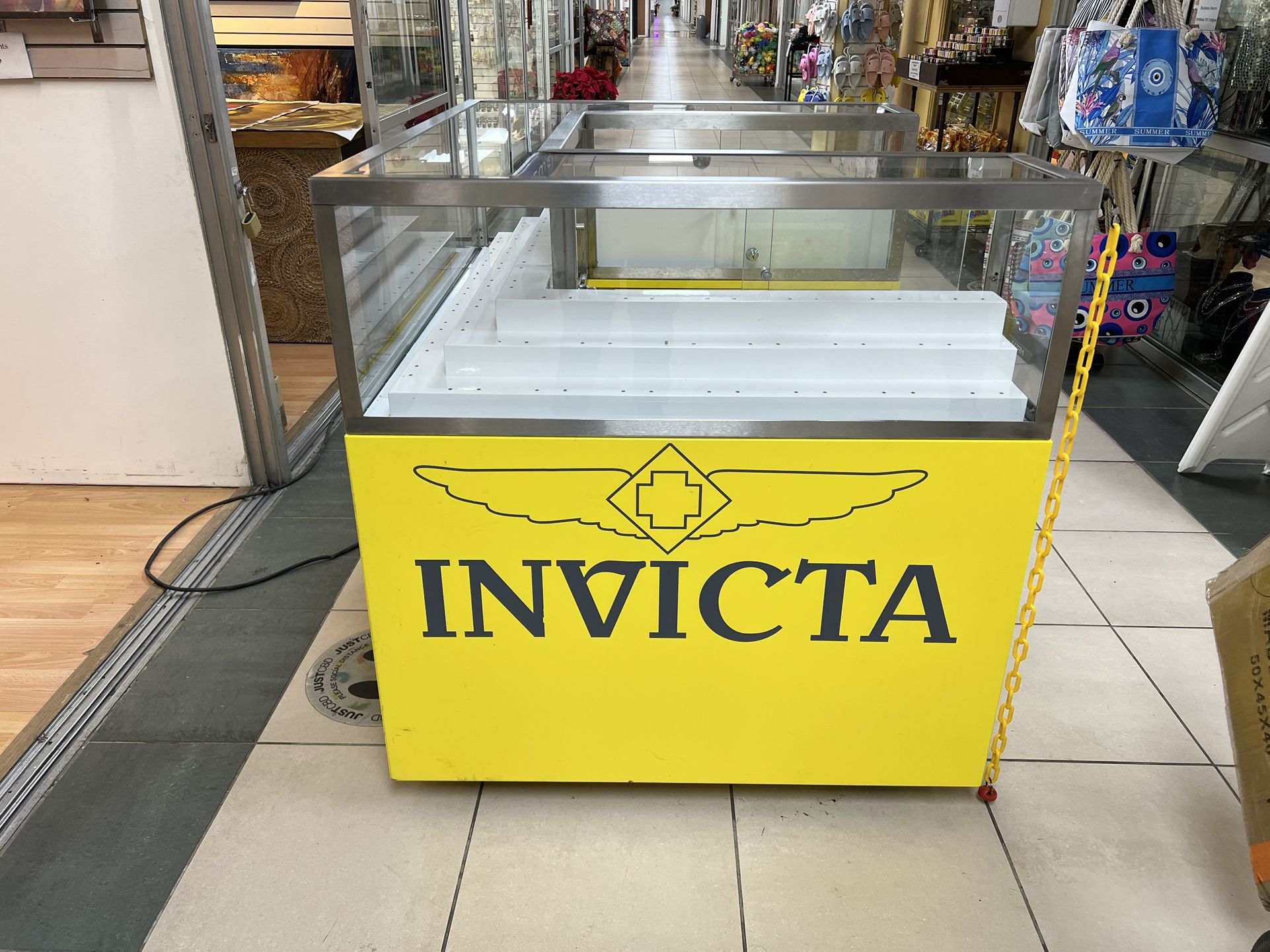 Show case Invicta Store fixture display with cabinets