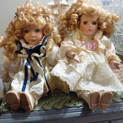 Vintage Porcelain wind- up Musical Dolls - Brand New- $35  for both