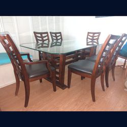 Beautiful Dining Room Table Glass Top Six Leather Chairs