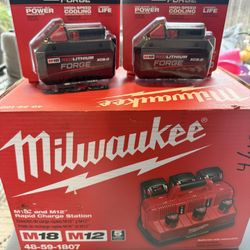 M12- M18.. Rapid Charger Station.. Milwaukee. And 2 FORGE batteries.. 8-0.. BRAND NEW.. $500