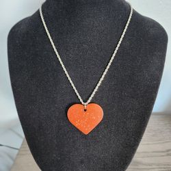 Red Jasper Orgonite Heart Necklace – Copper & Resin Pendant, Stainless Steel Chain

Description:
This necklace features an orgonite heart pendant craf
