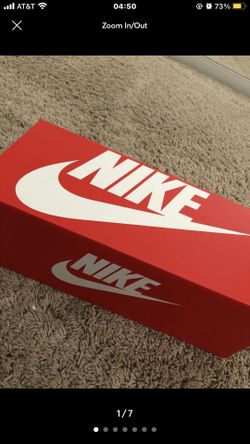 red and black nike slides