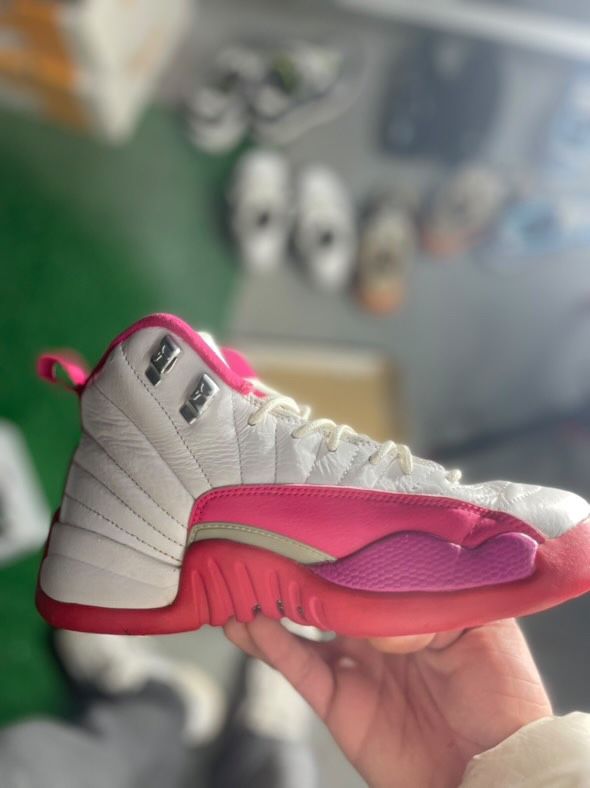 Pink Jordan 12’s