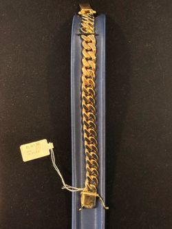 Curb bracelet 10k yellow gold 85.4G