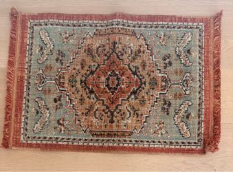 Small Persian style medallion area rug