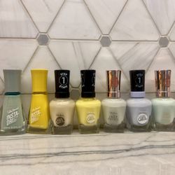Nail polish - Sally Hansen nail polish; Essie Nail polish - colors shown. New/