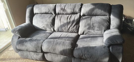 Recliner couch tv stand and 55inch smart tv