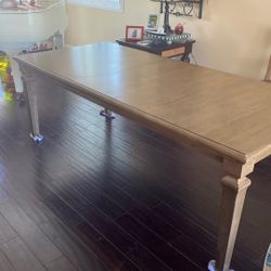 Brand New Ashley Dinning Room Table.   