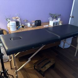 Massage table