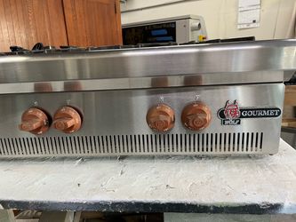 Wolf Gourmet counter top stove , 6 burners, stainless steel unit,36” inches wide,