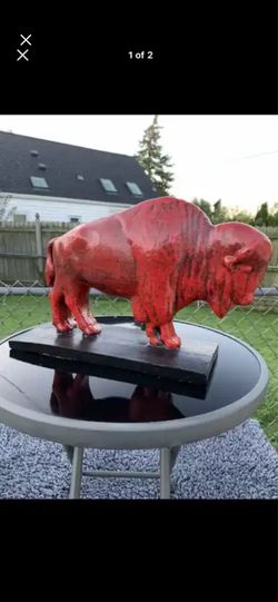 The red buffalo statue