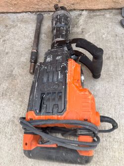 Electric Demolition Hammer / Jackhammer (SDS-Max or Hex Shank, commonly used for breaking concrete, chipping tile, and heavy demolition work).