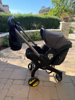 Doona Car seat/Stroller + Accessories