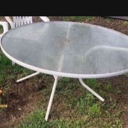 Large Table And 3 Plastic Chairs 