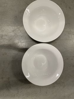 Two large round serving platters