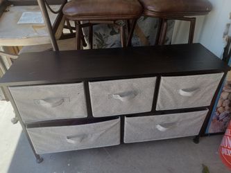 Used like new metal wood and cloth tv stand