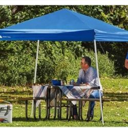 Canopy Ozark Trail Refugio Instantáneo con Patas Inclinadas de 10' x 10' para Sombra Al Aire Libre, Azul