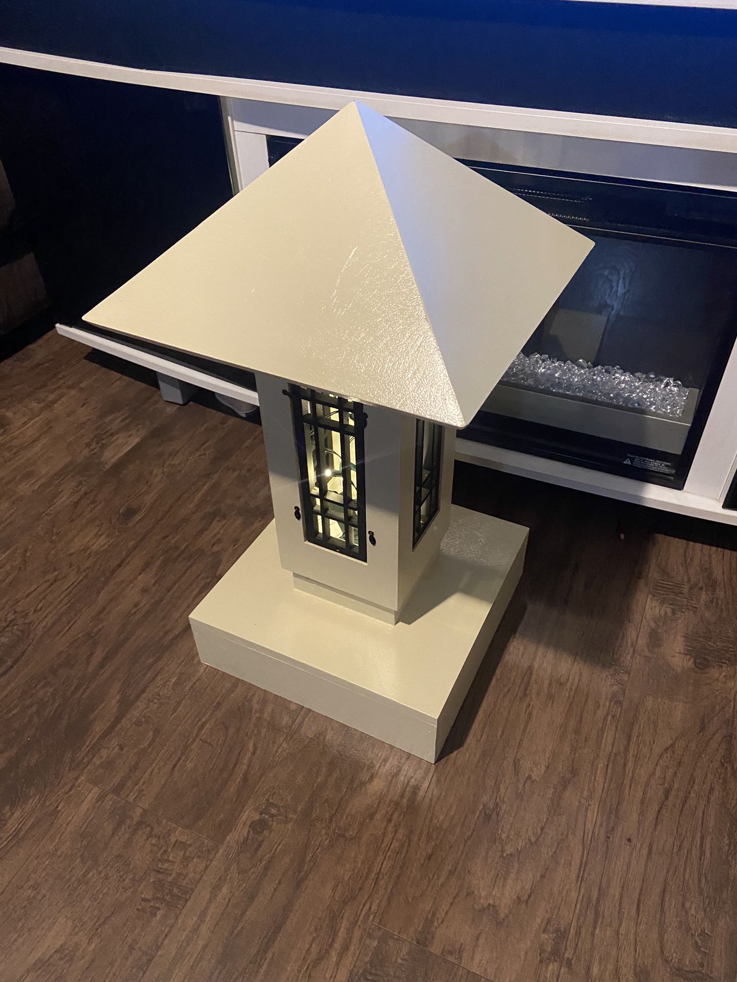 wooden pyramid decoration with light