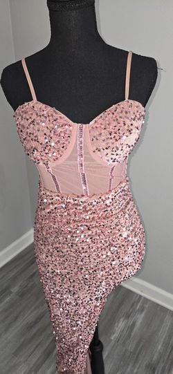 Pink sequin bodycon dress with corset back and a slit