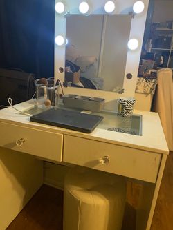 White Vanity and white swivel booth chair