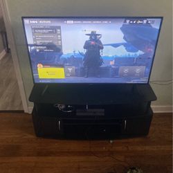 55” Tv And Stand 