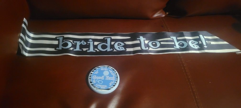 Bride to be!" sash, which is a popular accessory for bridal showers and bachelorette parties. The image also features a "Good Fun!" button, likely a p