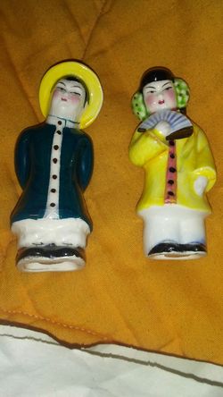 Vintage oriental salt and pepper shakers