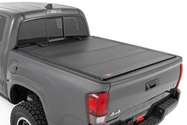 Rough Country Hard Tri-Fold Flip Up Bed Cover Toyota Tacoma 2WD/4WD (16-23)