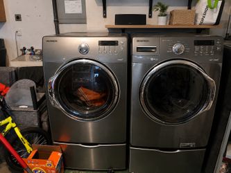 Washer and dryer all on a pedestal