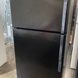 GE  Black Refrigerator Top Freezer. 
